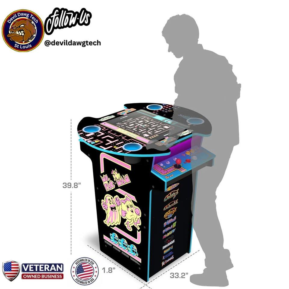 Reconditioned - ARCADE1UP Ms. PAC - MAN / GALAGA Pub Table Arcade Machine 12 Games in 1 with dimensions and a player silhouette.